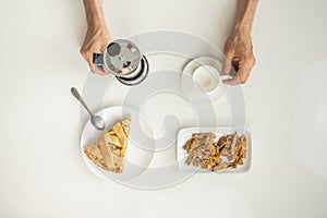 Top view of minimalistic table with business lunch with coffee,