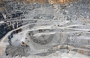 Top view of mining quarry. Giant open pit.