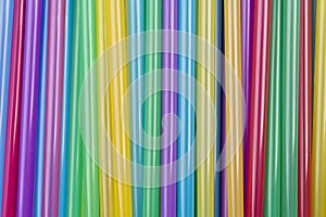 Top view of mixed colored plastic straws