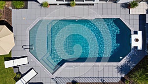 Top View of Modern Backyard Pool with Lounge Area â AI Generated Content