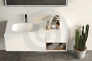 Top view of modern bathroom cabinet with white wall, concrete floor and comfortable basin with black