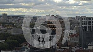 Top view of modern buildings and facades of city. Stock footage. Beautiful view of city between modern high-rise