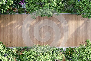 Top view of modern contemporary style empty wooden terrace in colorful flower garden 3d render