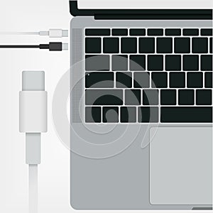 Top view of modern laptop with USB type C connectors isolated on white background.