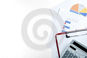 top view of modern white desk with office equipment and report papers on white background.