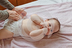 Top View Mom Changing Diaper To Baby