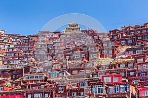 Top view monastery at Larung gar Buddhist Academy in sunshine day and background is blue sky