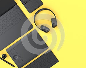 Top view of monochrome designer workspace and photography gear on yellow