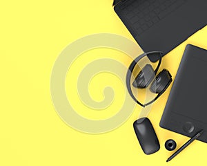 Top view of monochrome designer workspace and photography gear on yellow