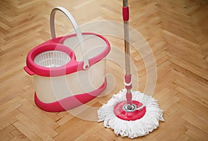 Top view of mop and bucket for washing floors