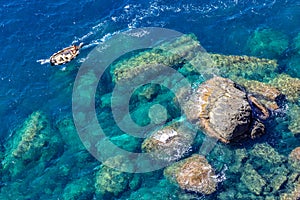 Top view of a motorboat in mediterranean sea