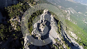 Top view of the mountain top. Shot. Sharp mountain top on a Sunny day. Incredible view