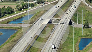 Top view of multilane american highway with rapid driving cars during rush hour in Sarasota county, Florida. View from