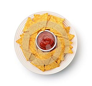 Top view of nacho chips and tomato dip sauce photo