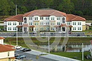 Top view of new apartment condos in Florida suburban area. Family housing in quiet neighborhood. Real estate development