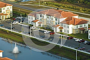 Top view of new apartment condos in Florida suburban area. Family housing in quiet neighborhood. Real estate development