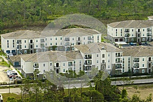 Top view of new apartment condos in Florida suburban area. Family housing in quiet neighborhood. Real estate development