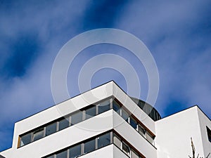 Top view  of a new, modern  apartment building with blue sky