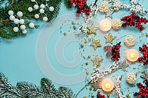 Top view on new year pattern on light blue background with colorful decoration ornaments things. Concept of winter, christmas or