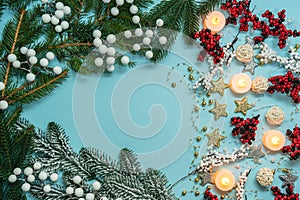 Top view on new year pattern on light blue background with colorful decoration ornaments things. Concept of winter, christmas or