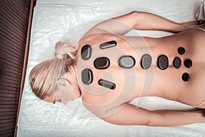 Top view of a nice woman during spa procedure