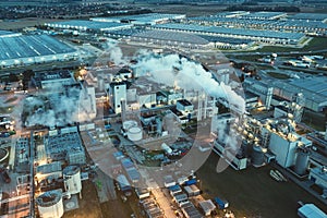 Top view at night on a large number of industrial enterprises for the refining of oil and the production of gasoline