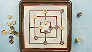 Top view of nine men Morris board game