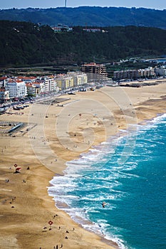 Top view of ocean sandy shore and waves.