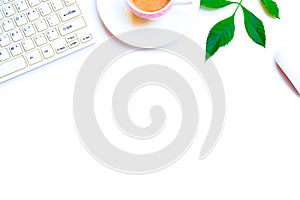 Top view office desk with computer table  white keyboard,notebook, with copy space on white background