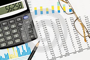 Top view office table desk. Financial report. Flat lay. Workspace with Business office supplies, Accounts number on the data paper