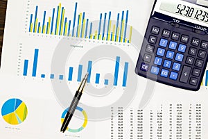 Top view office table desk. Financial report. Flat lay. Workspace with Business office supplies, Accounts number on the data paper