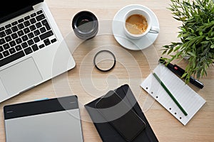 Top view of office work desk with laptop