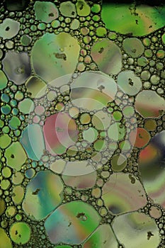 Top view of an oily colorful surface