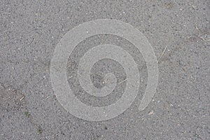 Top view of old asphalt pavement with numerous cracks