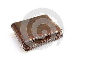 Top view of old brown leather wallet isolated on white background.