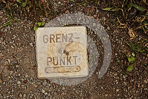 Top view of an old German boundary stone 
translation: boundary point