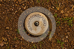 Top view of an old German boundary stone 
translation: survey point