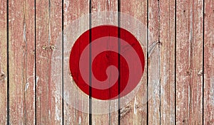 Top view of Old Painted Flag of Japan on Dark Wooden Fence, wall. patriot and travel concept. no flagpole. Flag background. Plane