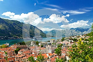 Top view of the old town and big ship in Kotor, Montenegro