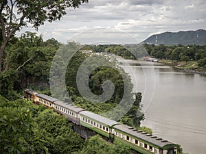 Top view of the old train on the bridge over the river Kwai in Kanchanaburi, Thailand