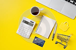 Top view of online shopping concept with credit card and smart phone