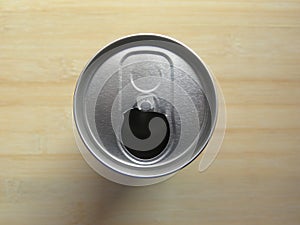 Top view of open beverage drink can without pop tab