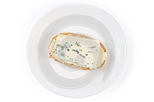 Top view of open sandwich with butter and blue cheese