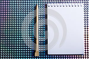 Top view of open spiral blank notebook with pen with copy space. mockup design