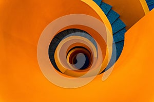 Top view of an orange spiral staircase