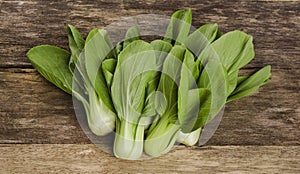 Top view of Overhead shot of Chinese cabbage, Bok Choy, on rustic wood