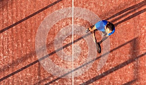 Top view of a padel player who is in his position waiting to hit the ball