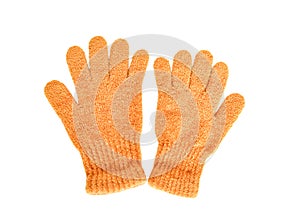 Top view a pair of  yellow dark knitted gloves on white background isolated and clipping path. Accessories for keep warm in winter