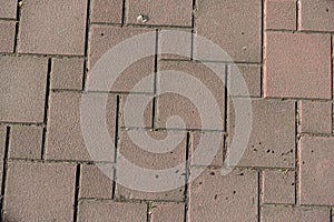 Top view of pale pink pavement with hopscotch layout