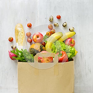 Top view paper bag of different fresh health food